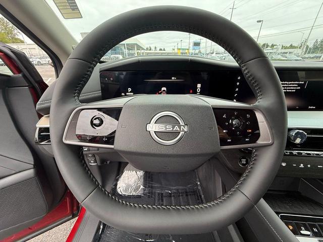 Photo of 2025 Scarlet Ember Tintcoat/Super Black Nissan Murano