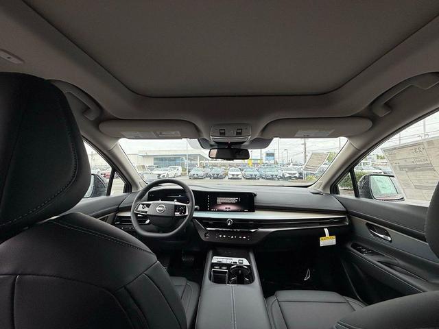 Photo of 2025 Scarlet Ember Tintcoat/Super Black Nissan Murano