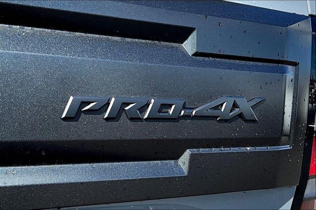 Photo of 2025 Boulder Gray Pearl Nissan Frontier