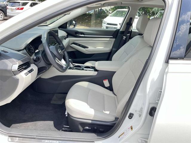 Photo of 2024 Pearl White Tri-Coat Nissan Altima