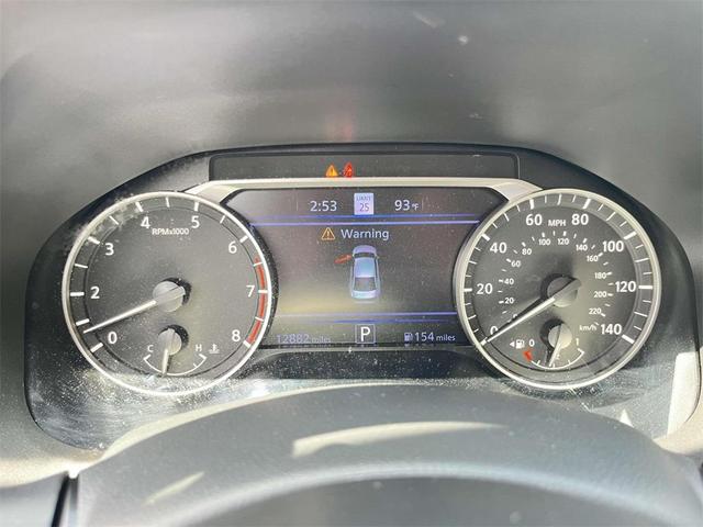 Photo of 2024 Pearl White Tri-Coat Nissan Altima