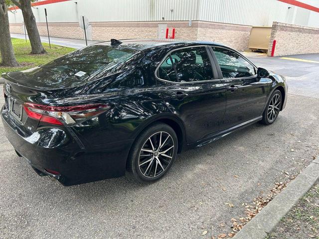 Photo of 2024 Midnight Black Metallic Toyota Camry