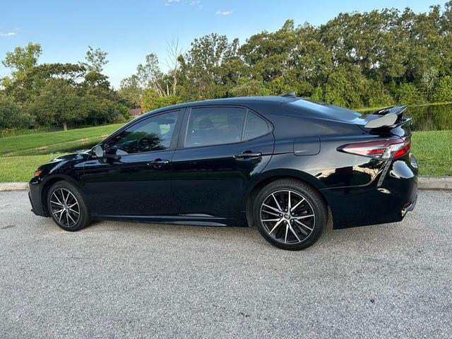Photo of 2023 Midnight Black Metallic Toyota Camry