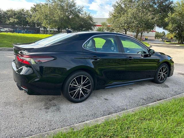 Photo of 2024 Midnight Black Metallic Toyota Camry