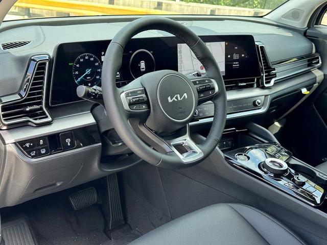 Photo of 2025 Blue Kia Sportage Hybrid