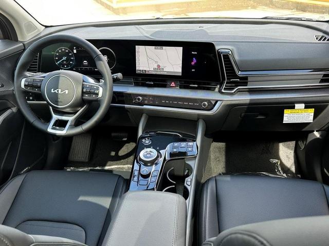 Photo of 2025 Fusion Orange Kia Sportage Hybrid