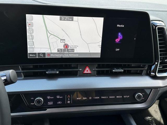 Photo of 2025 Fusion Orange Kia Sportage Hybrid