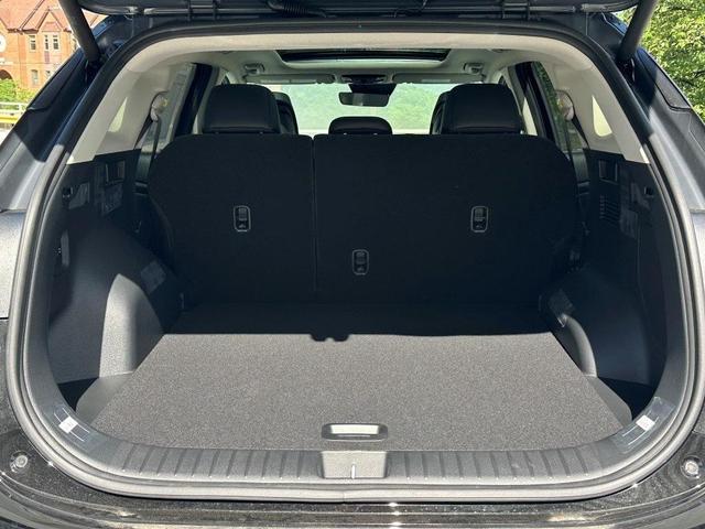 Photo of 2025 Fusion Orange Kia Sportage Hybrid