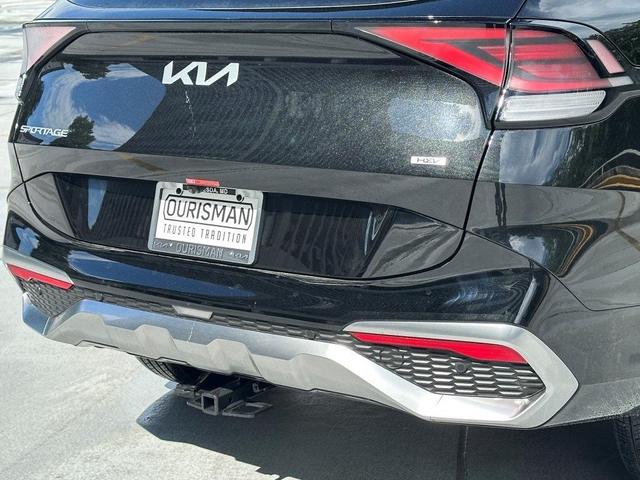 Photo of 2025 Fusion Orange Kia Sportage Hybrid