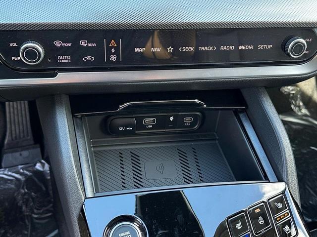 Photo of 2025 Fusion Orange Kia Sportage Hybrid