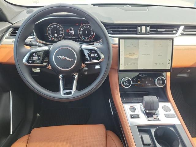 Photo of 2026 Ostuni Pearl White Jaguar F-PACE