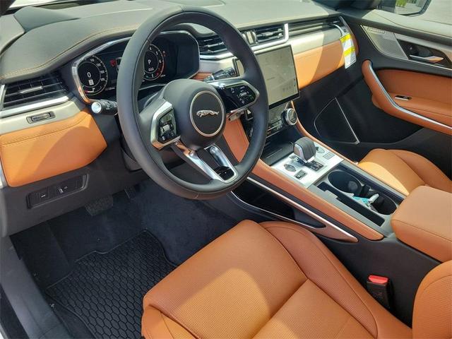 Photo of 2026 Ostuni Pearl White Jaguar F-PACE