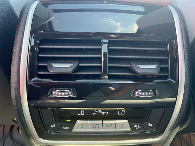 Photo of 2023 Mineral White Metallic BMW X5