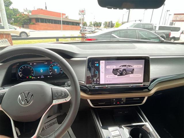 Photo of 2024 Deep Black Pearl Volkswagen Atlas Cross Sport