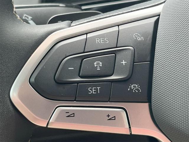 Photo of 2024 Deep Black Pearl Volkswagen Atlas Cross Sport