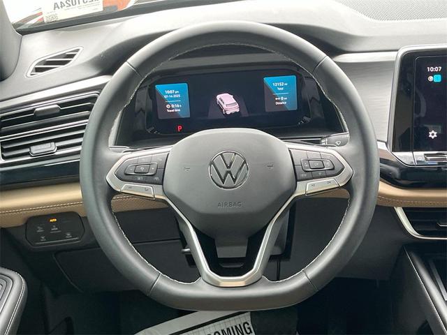 Photo of 2024 Deep Black Pearl Volkswagen Atlas Cross Sport