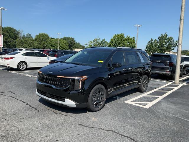 Photo of 2026 Aurora Black Pearl Kia Carnival Hybrid