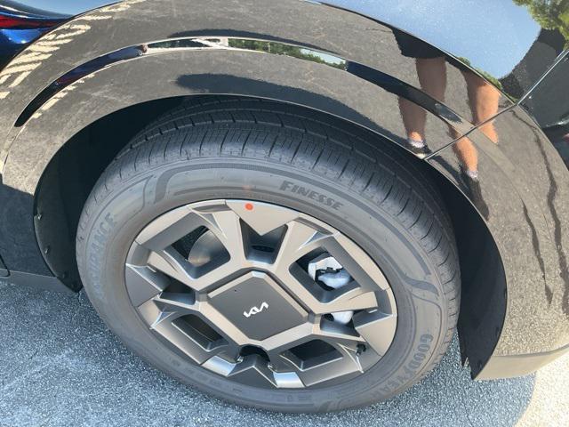 Photo of 2026 Aurora Black Pearl Kia Carnival Hybrid