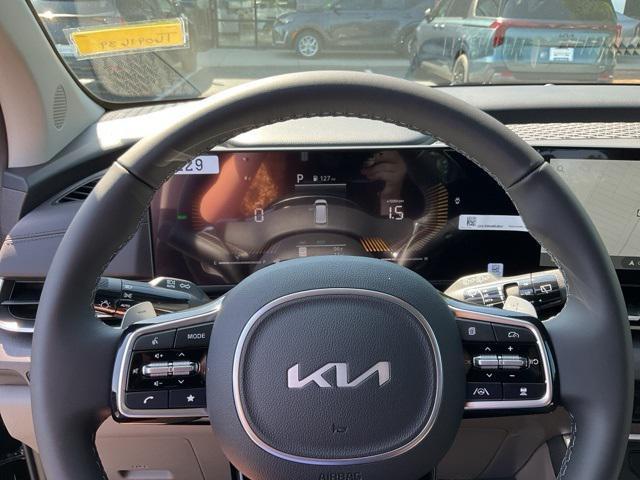 Photo of 2026 Aurora Black Pearl Kia Carnival Hybrid