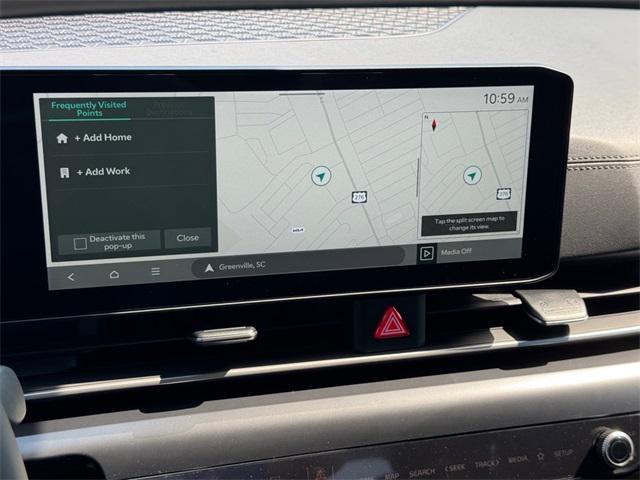 Photo of 2026 Flare Red Kia Carnival Hybrid