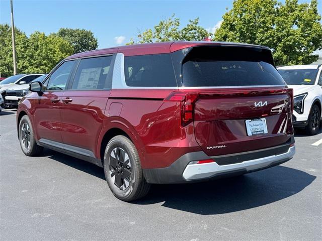 Photo of 2026 Flare Red Kia Carnival Hybrid
