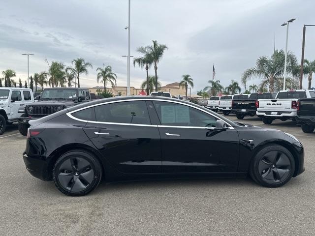 Photo of 2018 Black Tesla Model 3