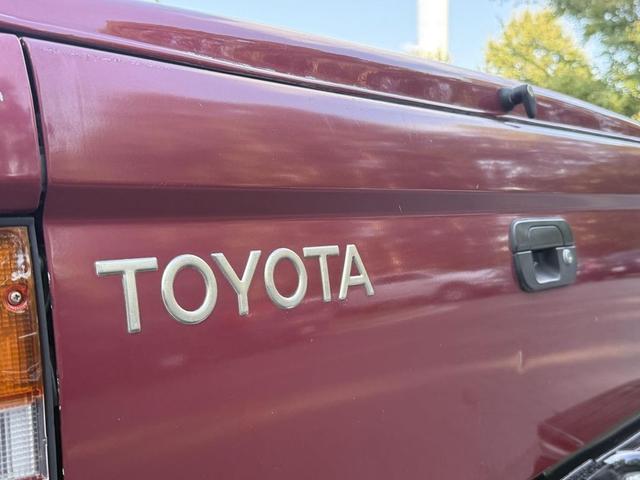 Photo of 1999 Red Toyota Tacoma