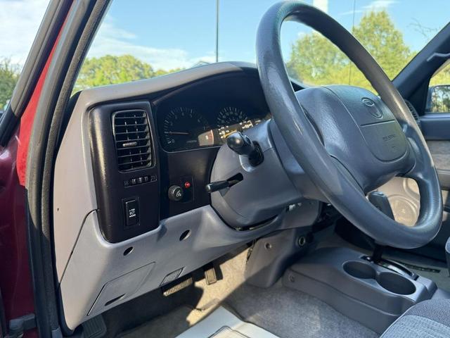 Photo of 1999 Red Toyota Tacoma