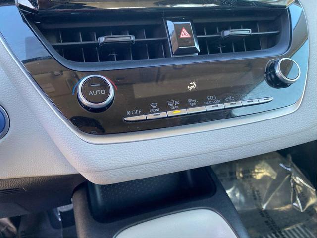 Photo of 2022 Ruby Flare Pearl Toyota Corolla Hybrid