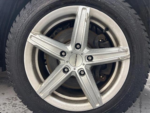 Photo of 2013 Silver Nissan NV200