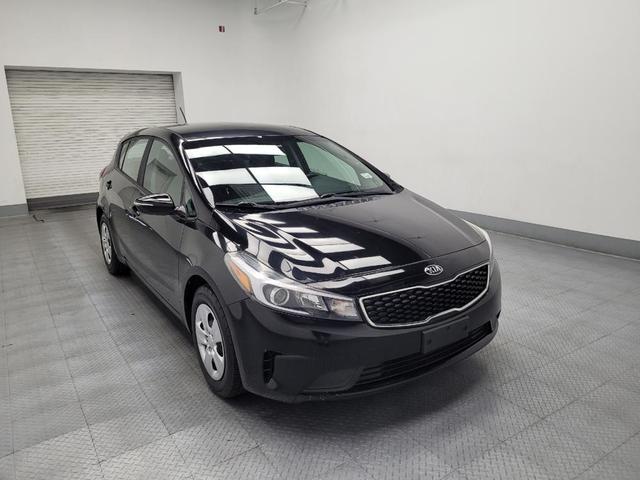 Photo of 2017 Aurora Black Kia Forte