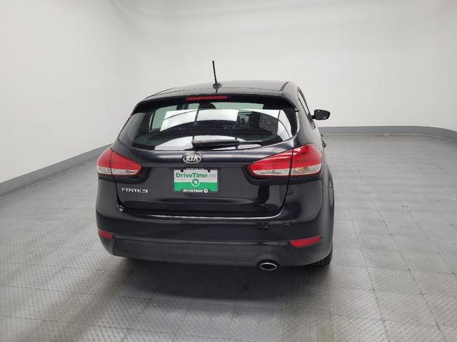 Photo of 2017 Aurora Black Kia Forte