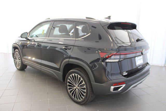 Photo of 2025 Deep Black Pearl exterior Volkswagen Taos