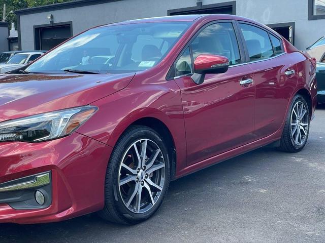 Photo of 2018 Burgundy Subaru Impreza