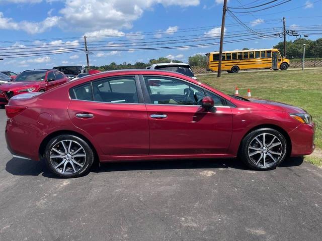 Photo of 2018 Burgundy Subaru Impreza
