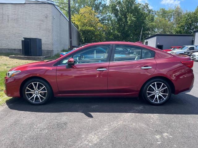 Photo of 2018 Burgundy Subaru Impreza