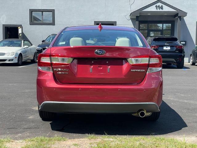 Photo of 2018 Burgundy Subaru Impreza