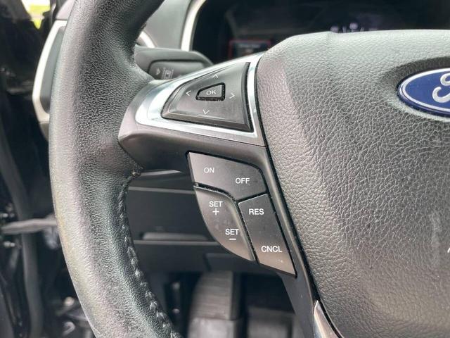 Photo of 2021 Agate Black Metallic Ford Edge