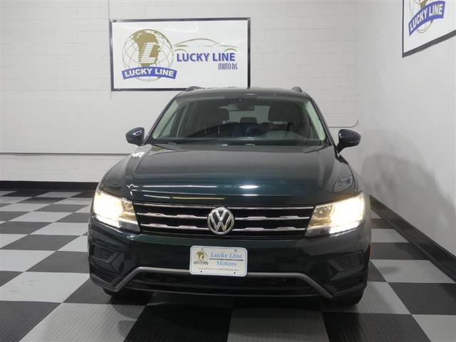 Photo of 2019 Dark Moss Green Metallic Volkswagen Tiguan