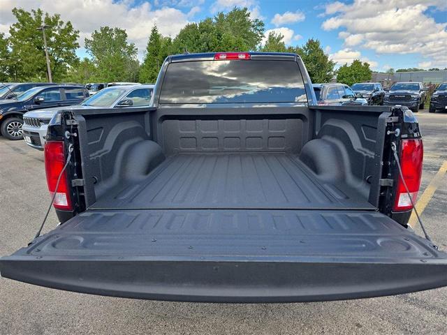 Photo of 2024 Diamond Black Crystal Pearlcoat RAM 1500