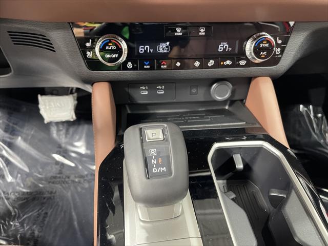 Photo of 2025 Red Diamond With Black Roof Mitsubishi Outlander
