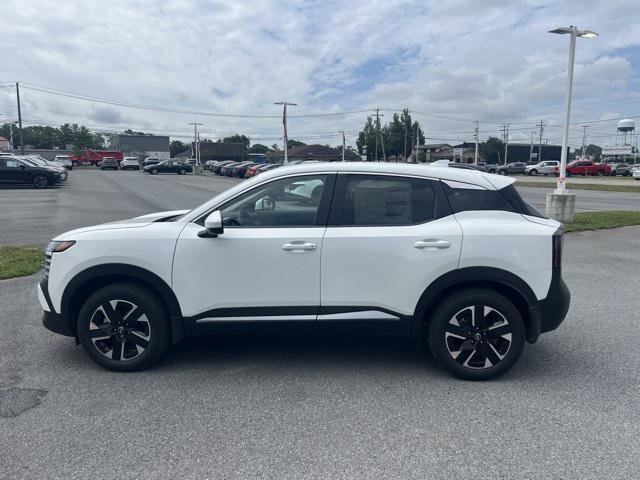 Photo of 2025 Aspen White Tricoat Nissan Kicks