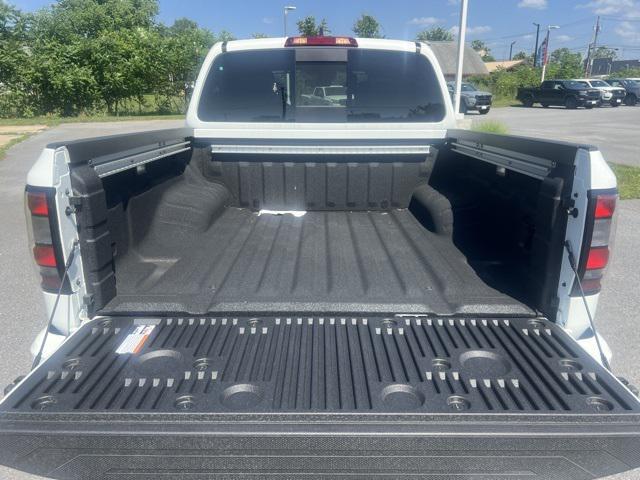 Photo of 2025 Glacier White Nissan Frontier