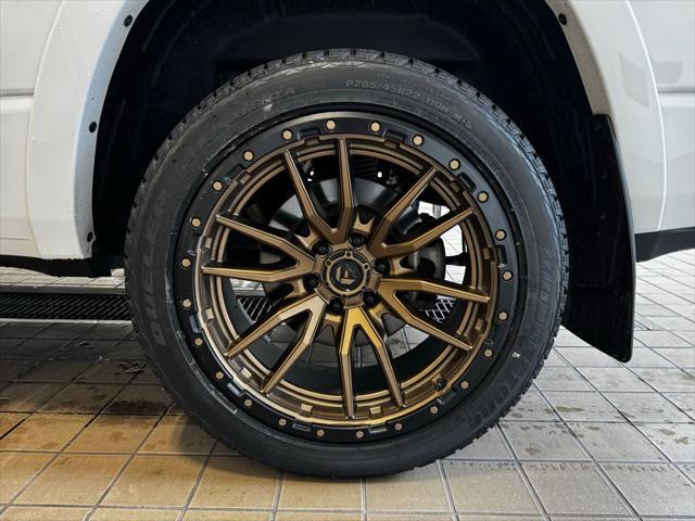 Photo of 2023 Ivory White Tri-Coat Pearlcoat RAM 1500