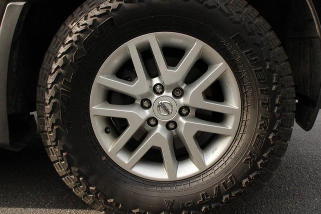 Photo of 2020 Magnetic Black Pearl Nissan Frontier