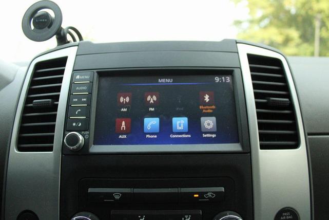 Photo of 2020 Magnetic Black Pearl Nissan Frontier