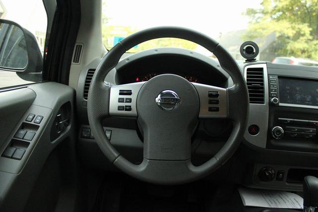 Photo of 2020 Magnetic Black Pearl Nissan Frontier