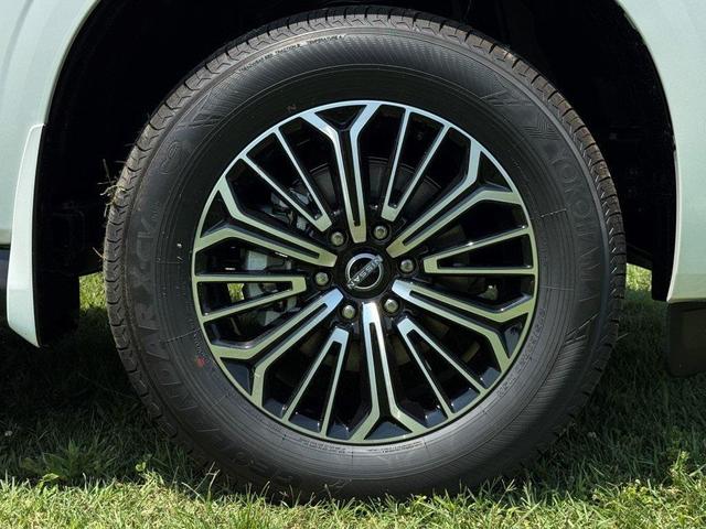 Photo of 2025 Aspen White Tricoat Nissan Armada
