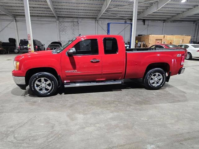 Photo of 2011 Fire Red GMC Sierra 1500