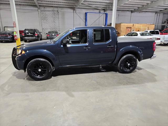 Photo of 2016 Arctic Blue Metallic Nissan Frontier